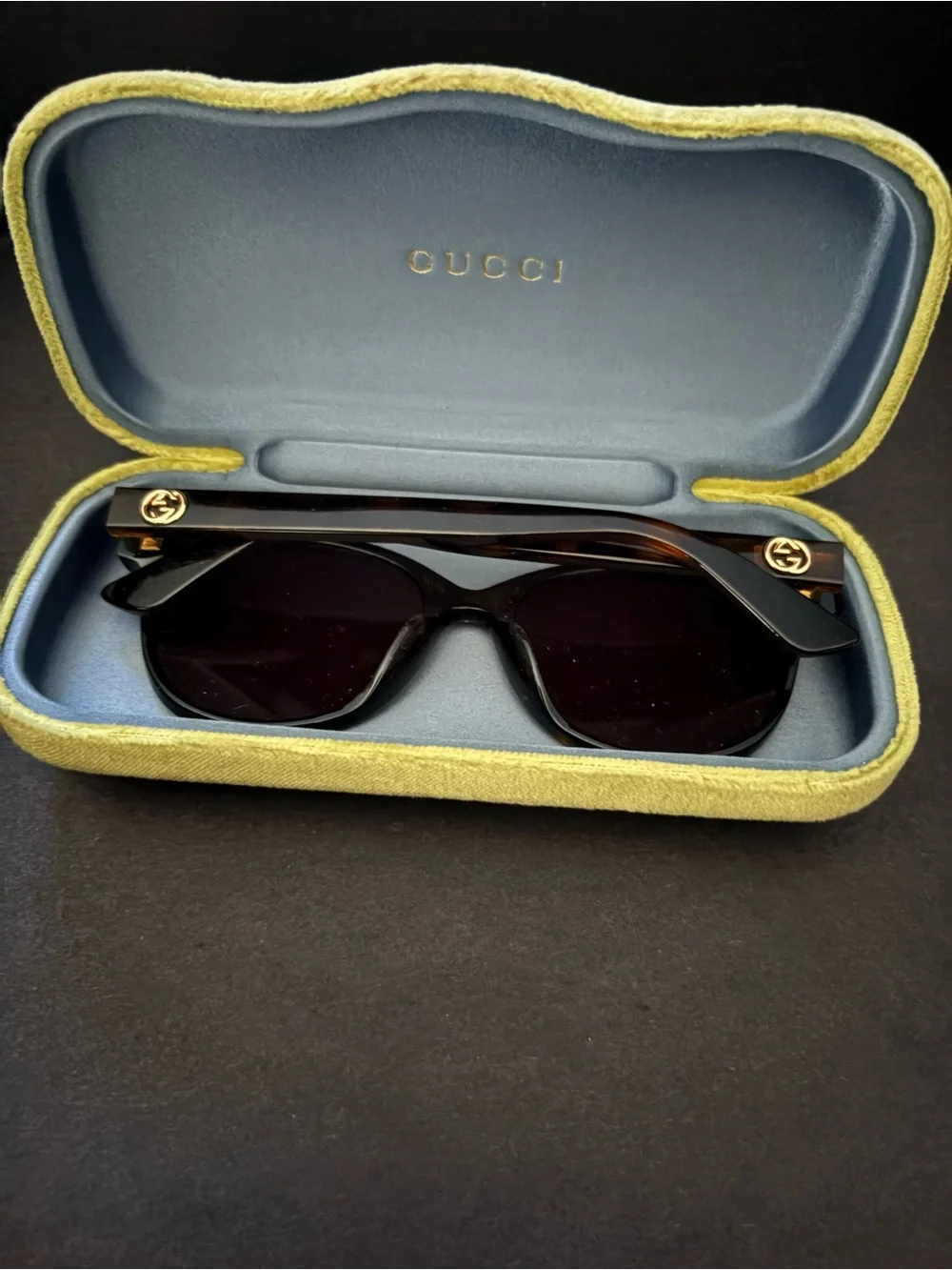 Gucci GGO7U3SK Black Sunglasses with Tortoiseshell Temples and Gold Logos